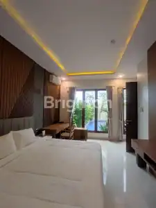 Interior of a modern villa bedroom near Kedungu Beach, Bali.