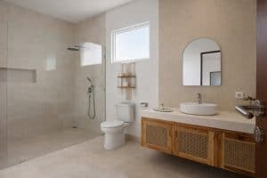 Bright and airy bathroom in a modern tropical villa with minimalist design.