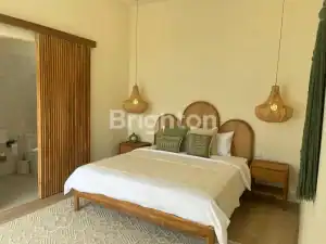 Elegant 4-bedroom fully furnished villa in Ungasan with enclosed living area and rooftop views. Perf.