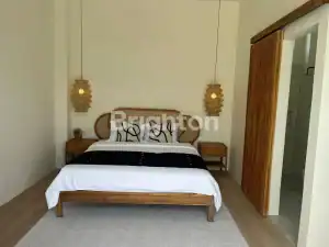 Elegant 4-bedroom villa with full furnishings in Ungasan, featuring enclosed living space and roofto.