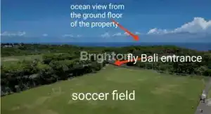 Ocean view from the ground floor of the property, with lush greenery and clear sky in the background.