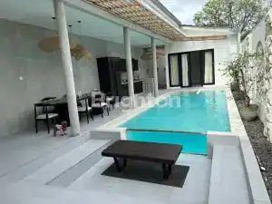 Stylish Legian villa featuring a private pool and outdoor dining area.