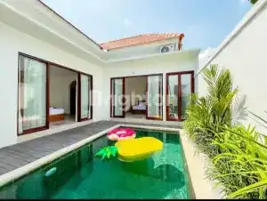 Modern 2-bedroom villa with private pool near Nuanu Creative City, featuring a rooftop view of lush.