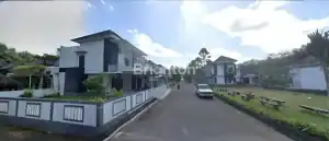 Security gate with 24-hour access at Rumah 1 Lantai in Tabanan area.