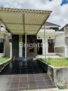 Single-story house with security gate and 24-hour security in Tabanan area.
