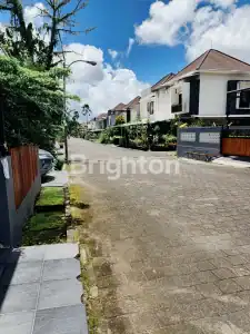 Secure residential home with 24-hour security in a peaceful neighborhood.