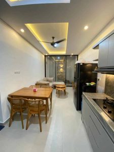 Modern villa interior with dining table, living space, and kitchen in Yeh Gangga, Tabanan. Perfect f.
