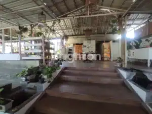 Indoor space of a former restaurant and coffee shop in Kerobokan, Bali.