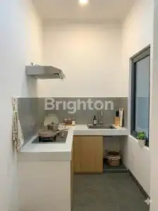 Modern kitchen with compact design close to Pasut Beach, Tabanan. Perfect for affordable coastal liv.