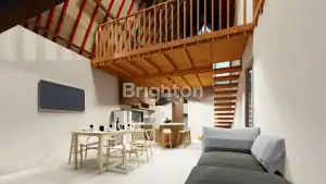 Bright, airy living space with wooden accents and high ceilings near Kelecung Beach.