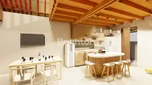 Stylish modern villa interior with open-plan kitchen and dining area near Kelecung Beach.